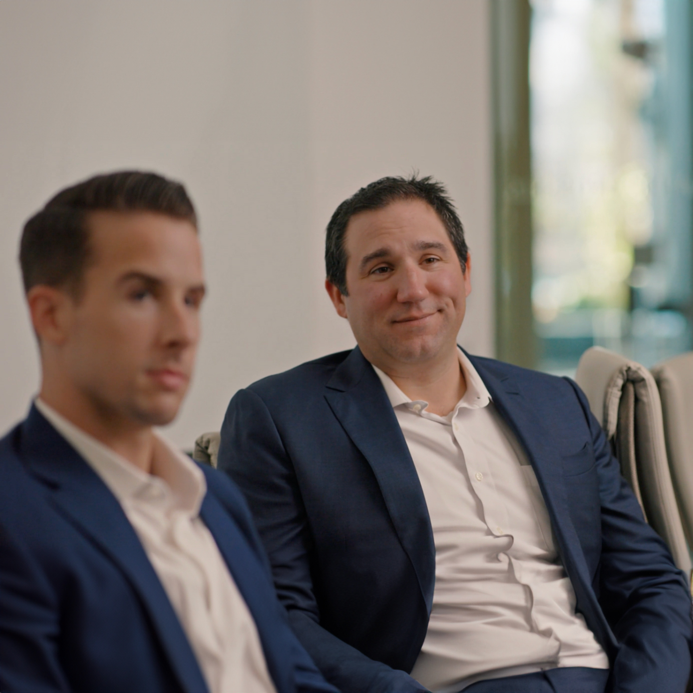 Chris Martin and Anthony DeLorenzo in meeting